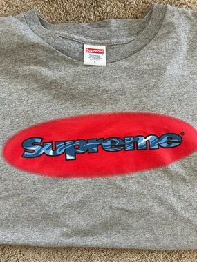 Supreme Grey Tee with Red Oval and Blue Logo